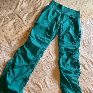 Kyodon “studio-like” turquoise track pants